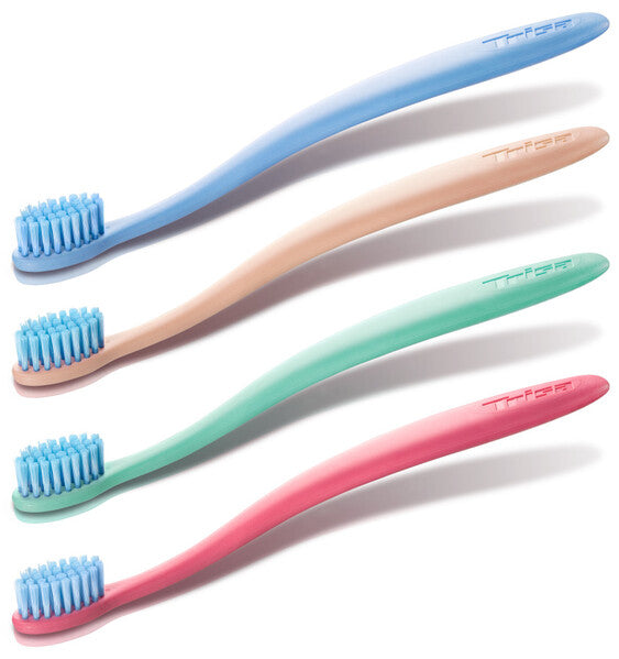 TRISA Compact Soft manual toothbrush with renewable handle and ultra-fine bristles range in assorted colors without packaging